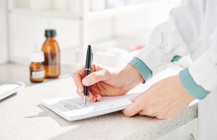 Provider writing prescription